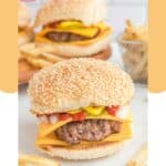 Two homemade McDonald's quarter pounder burgers.
