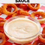 Homemade Outback Steakhouse bloomin onion sauce and onion rings around it.
