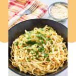 Homemade Pasta House fettuccine alfredo in a black bowl.
