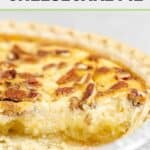 Pineapple pie with a slice cut out of it.