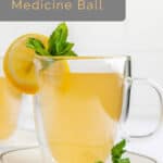Copycat Starbucks medicine ball tea drink garnished with lemon and mint.