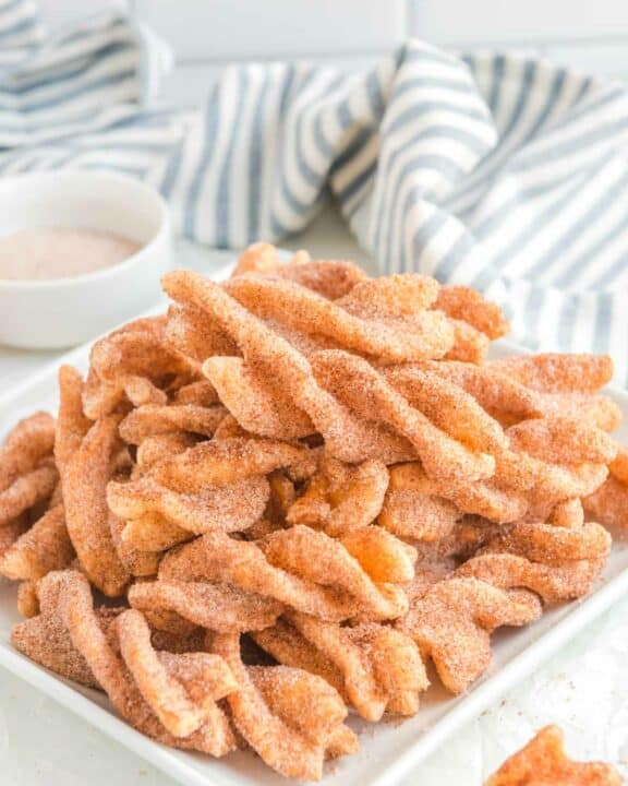 Copycat Taco Bell cinnamon twists on a plate.