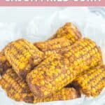 Homemade Wingstop cajun fried corn on the cob in a bowl lined with parchment paper.