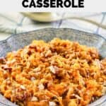 Homemade Burbank's sweet potato casserole with raisins and pecans in a blue bowl.