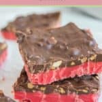 Two homemade cherry mash bars on parchment paper.