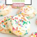 Homemade Crumbl birthday cake cookies scattered on a white surface.