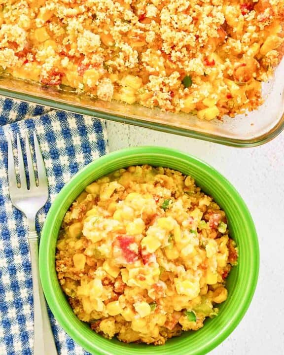 Overhead view of copycat Luby's Spanish Indian baked corn casserole in a bowl and baking dish.