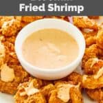Homemade Outback bloomin fried shrimp and bloomin sauce on a platter.