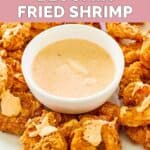Homemade Outback bloomin fried shrimp and a bowl of dipping sauce.