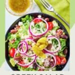 Overhead view of Panera Greek salad and Greek dressing in bowls.