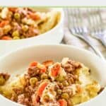 A bowl of shepherd's pie made with beef and gravy.