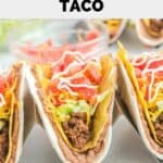 Homemade Taco Bell double decker taco in a taco rack.
