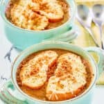 Copycat Brennan's French onion soup in two soup crocks.