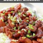 Copycat Cajun Cafe bourbon chicken over white rice on a platter.