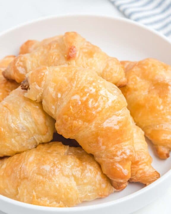 Copycat Cheddar's honey butter croissants on a plate.