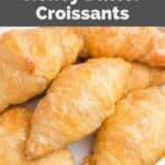 Closeup of homemade Cheddar's honey butter croissants on a plate.