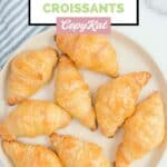 Overhead view of homemade Cheddar's honey butter croissants on a plate.