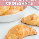 Homemade Cheddar's honey butter croissant in front of a bowl of them.