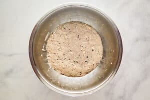 Blueberry pancake puppies batter in a bowl.