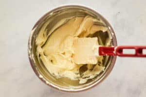 Cheesecake dip for pancake puppies in a mixing bowl.