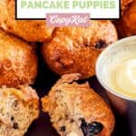 Homemade Denny's blueberry pancake puppies and one cut in half.