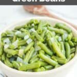 A bowl of homemade KFC green beans with onions.