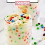 Homemade McDonald's M&M McFlurry and mini m&m's candies around it.