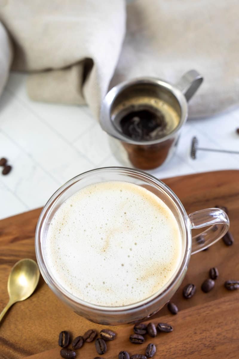 Overhead view of copycat Starbucks Oleato caffe latte and a shot of espresso.