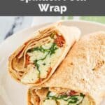 Homemade Starbucks spinach feta wrap on a white plate.