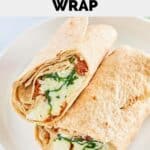 Homemade Starbucks spinach feta wrap cut in half and on a plate.