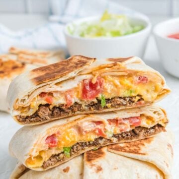 Copycat Taco Bell crunchwrap supreme on a marble surface.