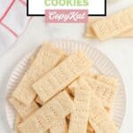 Overhead view of homemade Walkers shortbread cookies on a plate.
