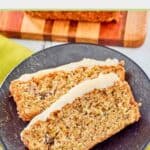 Overhead view of slices of zucchini bread with cream cheese frosting on a plate.