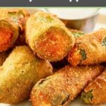 Cheddar cheese jalapeno poppers and dipping sauce on a tan plate.