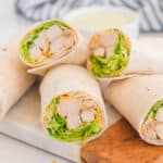 Copycat Chick Fil A cool wrap on a cutting board.