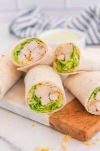 Copycat Chick Fil A cool wrap on a cutting board.