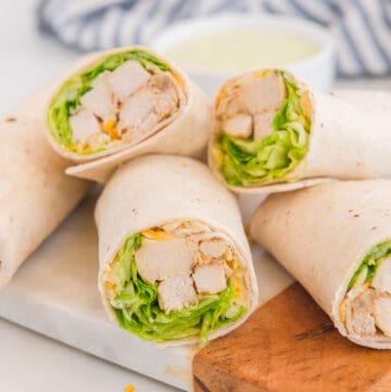 Copycat Chick Fil A cool wrap on a cutting board.