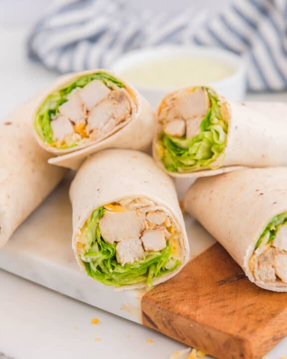 Copycat Chick Fil A cool wrap on a cutting board.