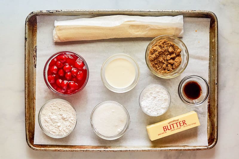 Copycat CiCi's cherry dessert pizza ingredients on a tray.