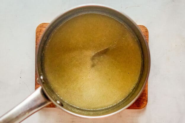 Melted butter and flour in a pan.