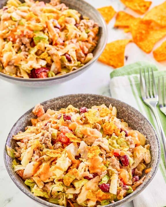 Dorito taco salad in two bowls.