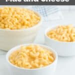 Homemade KFC mac and cheese in three white bowls.