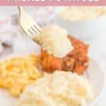 Homemade KFC mashed potatoes on a fork.