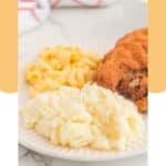 Homemade KFC mashed potatoes, fried chicken, and mac and cheese on a plate.