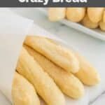 Homemade Little Caesars crazy bread wrapped in parchment.