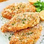 Copycat Luby's Italian chicken breast on a platter.