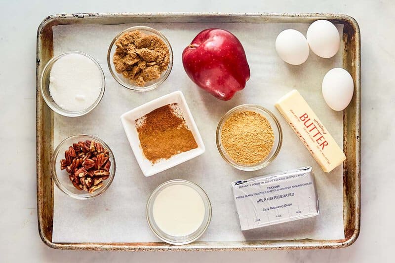 Olive Garden apple praline cheesecake ingredients on a tray.