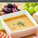 Homemade sweet hot mustard in a small white square bowl.