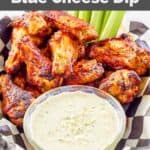 Homemade Wingstop blue cheese dip and chicken wings in a basket lined with parchment.