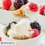 Homemade Brennan's oatmeal custard on a spoon with whipped cream and berries.